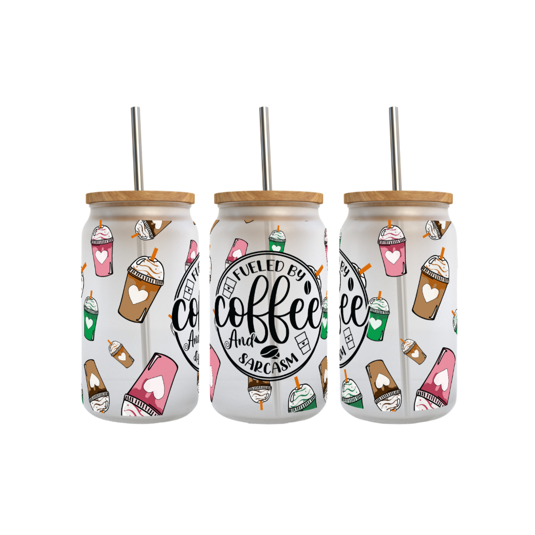 A set of three frosted glass tumblers with a coffee-themed design, featuring text and illustrations of coffee cups & lattes