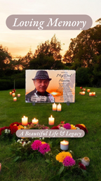Memorial with photo of a man, candles, and flowers in a garden setting with 'Loving Memory' text.