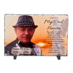 Memorial plaque with a photo of a man wearing a hat and text about letters to a deceased father.